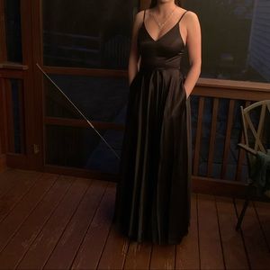 Black silk dress WITH POCKETS and a leg slit